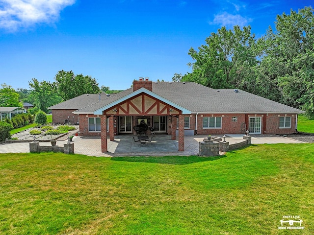 15442 W Purley Ct, Homer Glen, IL 60491 - back of property featuring a patio, a yard, and brick siding