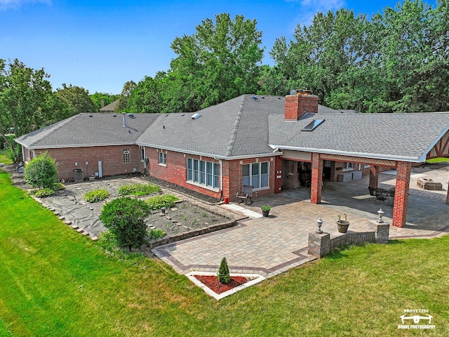 15442 W Purley Ct, Homer Glen, IL 60491 - rear view of property featuring brick siding, a patio area, a yard, and a chimney