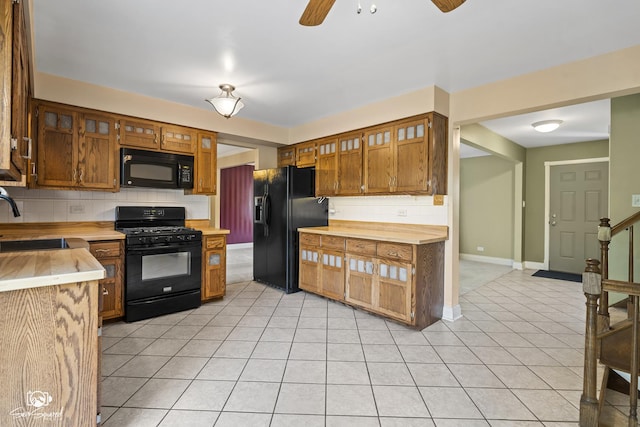 658 Brookside Ln, Frankfort, IL 60423 - kitchen featuring black appliances, light tile patterned flooring, tasteful backsplash, and ceiling fan
