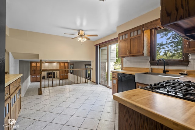 658 Brookside Ln, Frankfort, IL 60423 - kitchen featuring black dishwasher, butcher block counters, a ceiling fan, light tile patterned flooring, and tasteful backsplash