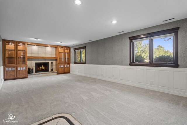 658 Brookside Ln, Frankfort, IL 60423 - unfurnished living room with a tile fireplace, carpet floors, and recessed lighting