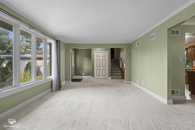 658 Brookside Ln, Frankfort, IL 60423 - carpeted spare room featuring stairs and crown molding