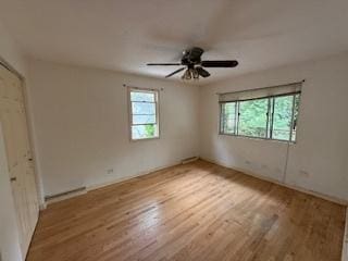 574 Isa Dr, Wheeling, IL 60090 - unfurnished room featuring wood finished floors and a ceiling fan