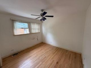 574 Isa Dr, Wheeling, IL 60090 - empty room with light wood-style floors and a ceiling fan