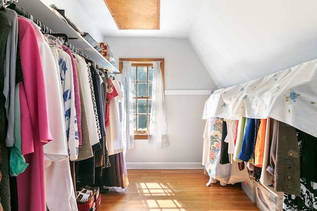 400 Selborne Rd, Riverside, IL 60546 - walk in closet featuring wood finished floors and lofted ceiling