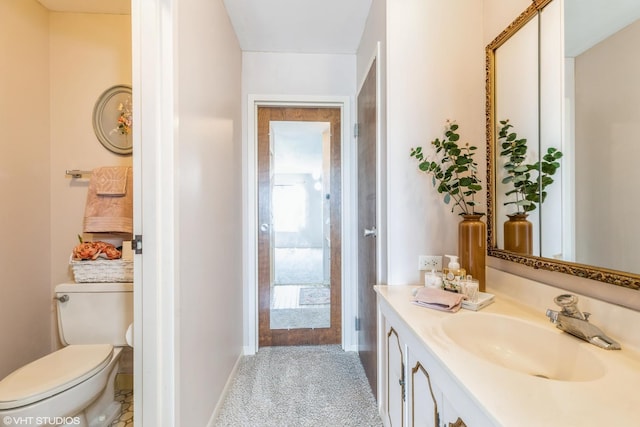 900 W Sunset Dr Unit 405, Glenwood, IL 60425 - bathroom featuring vanity and toilet