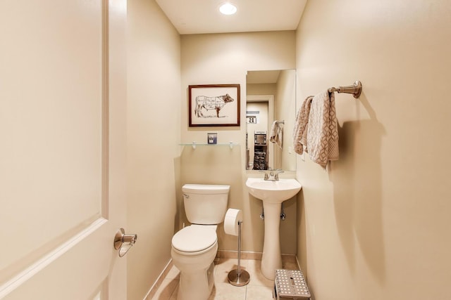 6067 N Oconto Ave, Chicago, IL 60631 - half bath featuring toilet and tile patterned floors