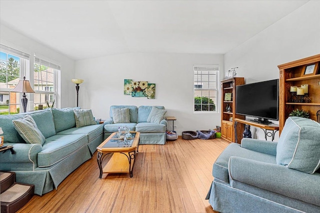 93 W Essington Dr Unit 93, Round Lake, IL 60073 - living area with lofted ceiling and light wood finished floors