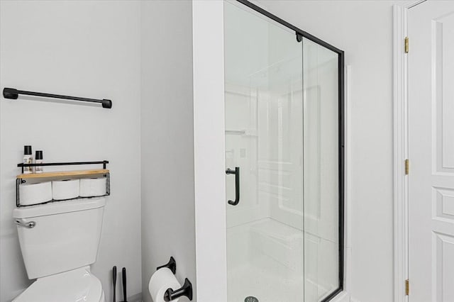 93 W Essington Dr Unit 93, Round Lake, IL 60073 - bathroom featuring a stall shower and toilet