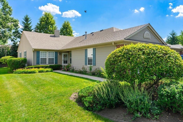 93 W Essington Dr Unit 93, Round Lake, IL 60073 - single story home featuring a front yard, a chimney, and roof with shingles