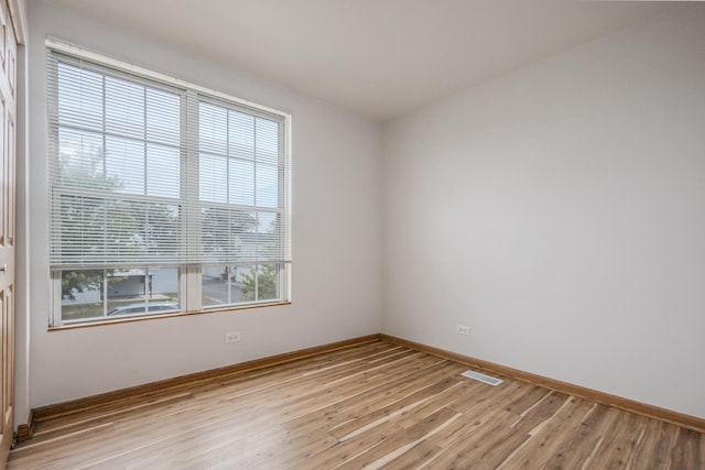 1501 Simms St, Aurora, IL 60504 - unfurnished room with plenty of natural light and light wood-style flooring