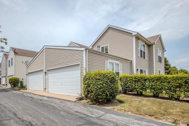 1501 Simms St, Aurora, IL 60504 - view of home's exterior featuring an attached garage