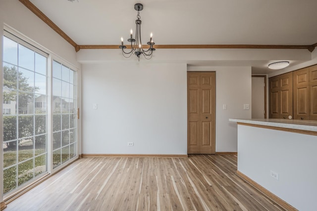 1501 Simms St, Aurora, IL 60504 - unfurnished room featuring a chandelier, light wood-type flooring, healthy amount of natural light, and ornamental molding