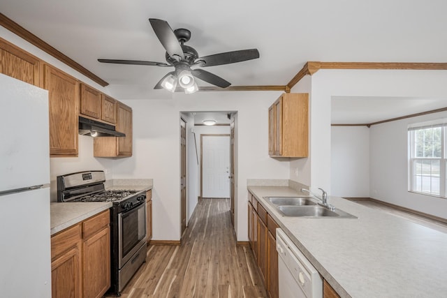 1501 Simms St, Aurora, IL 60504 - kitchen featuring white appliances, under cabinet range hood, crown molding, light countertops, and light wood-style flooring