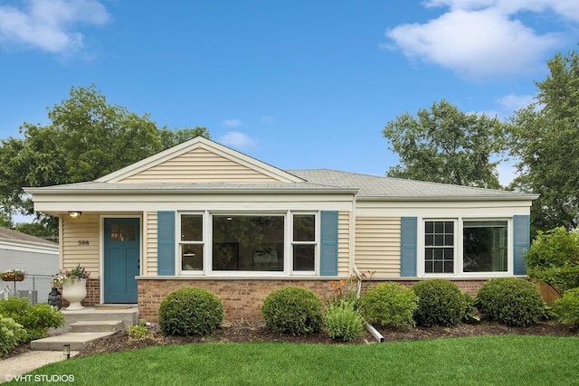 588 Glendale Ave, Glen Ellyn, IL 60137 - view of front of property featuring brick siding and a front yard