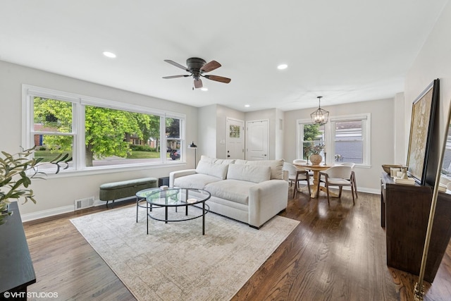588 Glendale Ave, Glen Ellyn, IL 60137 - living room featuring ceiling fan, dark wood-type flooring, recessed lighting, and a chandelier
