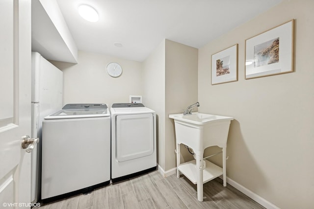 588 Glendale Ave, Glen Ellyn, IL 60137 - laundry area featuring washer and dryer and light wood-style floors
