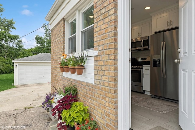 588 Glendale Ave, Glen Ellyn, IL 60137 - kitchen featuring stainless steel appliances, wood finished floors, light countertops, and recessed lighting