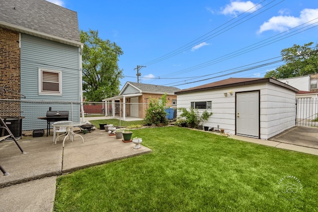 1246 N Monitor Ave, Chicago, IL 60651 - view of yard featuring a patio and an outdoor structure