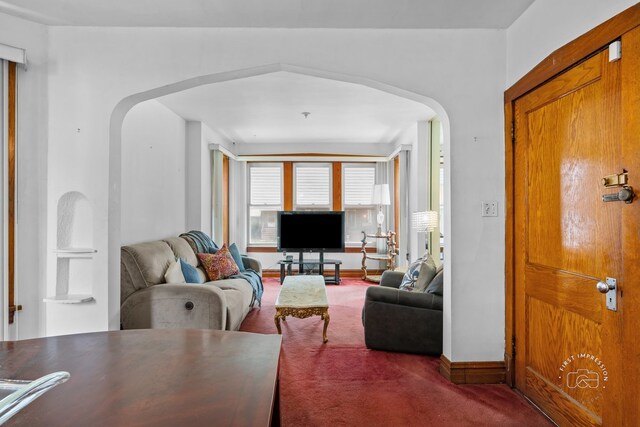 1246 N Monitor Ave, Chicago, IL 60651 - carpeted living area with arched walkways and baseboards