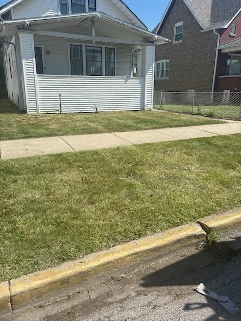 5624 W Eastwood Ave, Chicago, IL 60630 - bungalow-style house with a porch