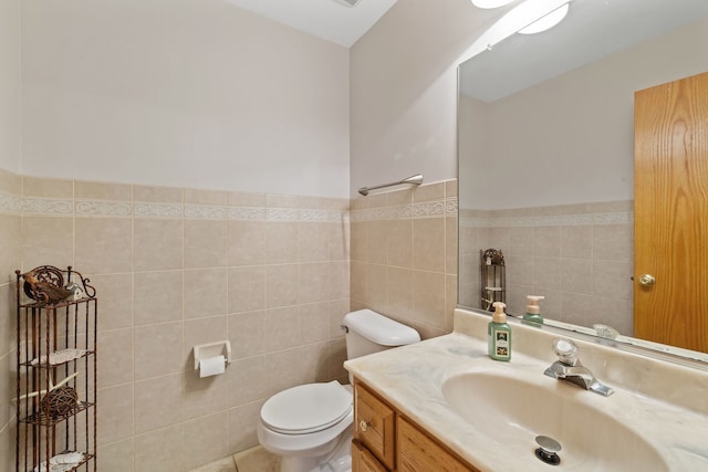 2301 Kerry Ln, Darien, IL 60561 - bathroom featuring vanity, tile walls, and wainscoting
