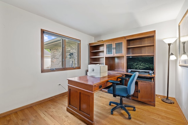 2301 Kerry Ln, Darien, IL 60561 - home office featuring baseboards and light wood-style floors