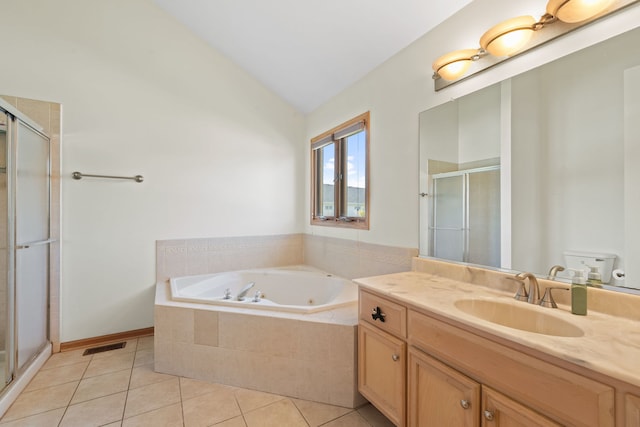 2301 Kerry Ln, Darien, IL 60561 - bathroom with vaulted ceiling, vanity, a whirlpool tub, tile patterned flooring, and a shower stall
