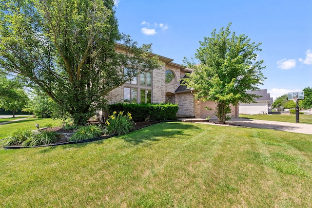 2301 Kerry Ln, Darien, IL 60561 - view of front facade featuring driveway, a front lawn, and brick siding
