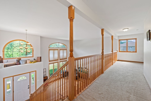 2301 Kerry Ln, Darien, IL 60561 - hall with carpet flooring, a chandelier, and an upstairs landing