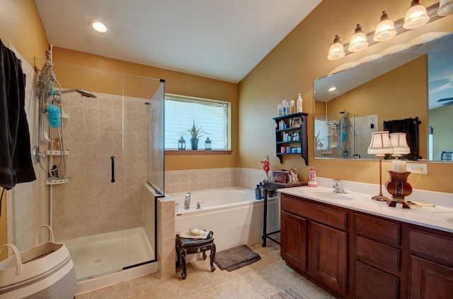 381 Chesapeake Ln, Oswego, IL 60543 - full bath featuring a bath, a stall shower, tile patterned floors, double vanity, and lofted ceiling