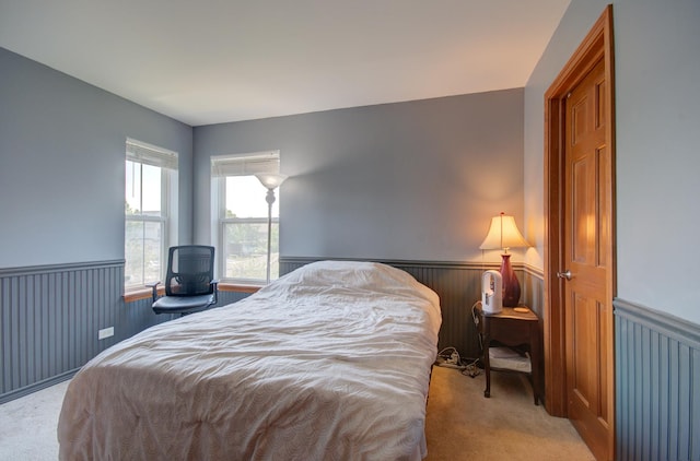 381 Chesapeake Ln, Oswego, IL 60543 - carpeted bedroom featuring a wainscoted wall