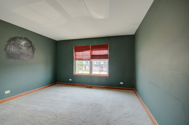 381 Chesapeake Ln, Oswego, IL 60543 - carpeted empty room with baseboards