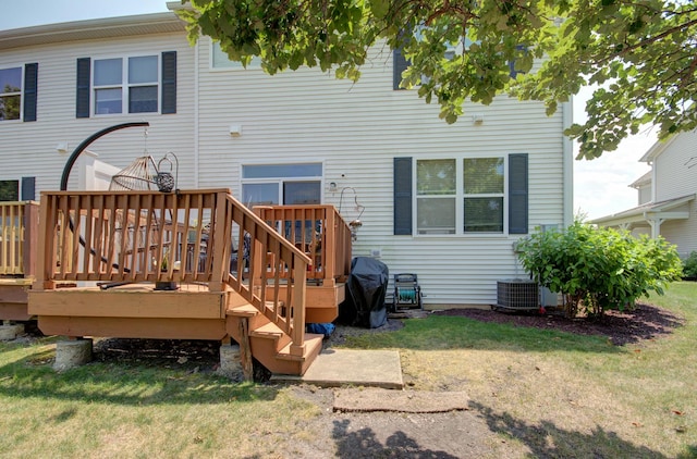 381 Chesapeake Ln, Oswego, IL 60543 - rear view of property with a wooden deck and a lawn