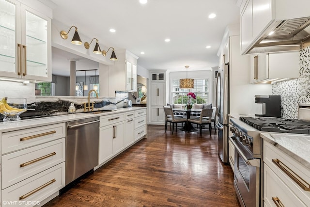 261 Woodstock Ave, Glen Ellyn, IL 60137 - kitchen with stainless steel appliances, custom range hood, decorative backsplash, white cabinets, and recessed lighting