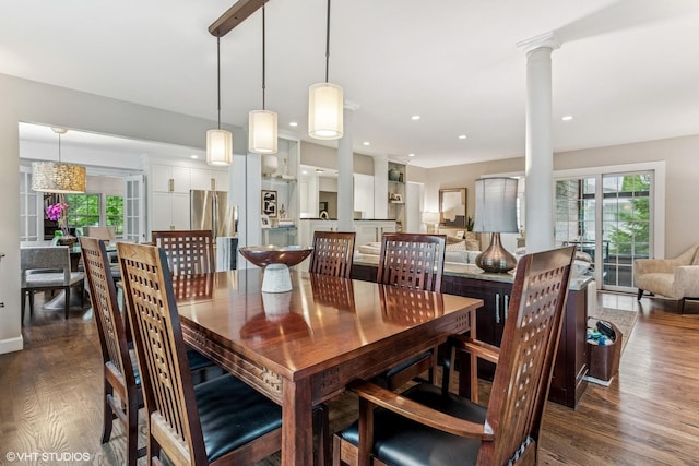 261 Woodstock Ave, Glen Ellyn, IL 60137 - dining area featuring dark wood-type flooring, decorative columns, and recessed lighting