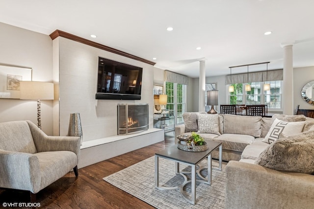 261 Woodstock Ave, Glen Ellyn, IL 60137 - living area with decorative columns, wood finished floors, recessed lighting, and a warm lit fireplace
