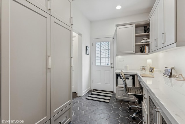 261 Woodstock Ave, Glen Ellyn, IL 60137 - laundry area featuring dark tile patterned floors, recessed lighting, and an office area