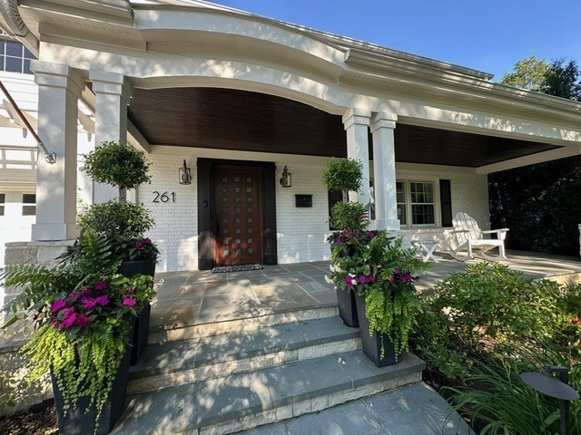 261 Woodstock Ave, Glen Ellyn, IL 60137 - entrance to property with covered porch and brick siding