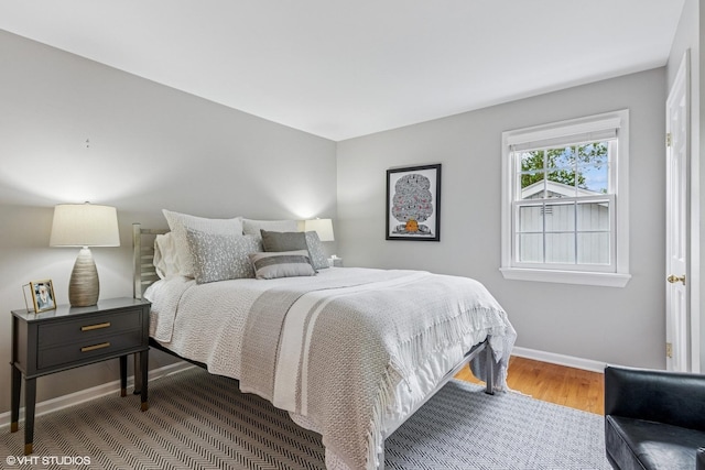 261 Woodstock Ave, Glen Ellyn, IL 60137 - bedroom featuring baseboards and wood finished floors