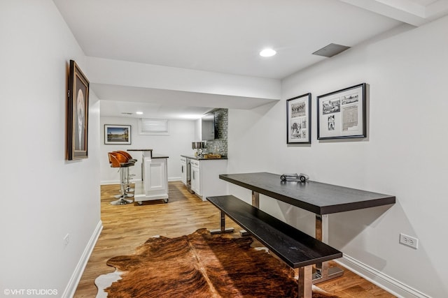 261 Woodstock Ave, Glen Ellyn, IL 60137 - dining room featuring light wood-style floors, recessed lighting, and bar area