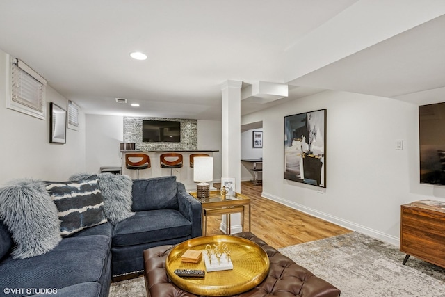 261 Woodstock Ave, Glen Ellyn, IL 60137 - living area featuring wood finished floors, recessed lighting, and bar area