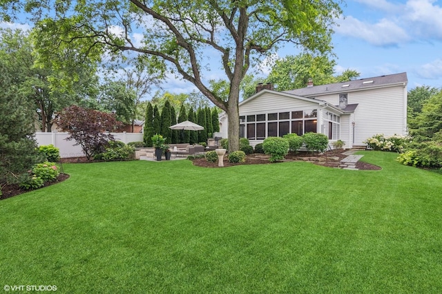 261 Woodstock Ave, Glen Ellyn, IL 60137 - view of yard with a sunroom, a patio area, and an outdoor hangout area