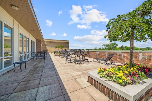 50 N Plum Grove Rd Unit 703E, Palatine, IL 60067 - view of patio / terrace with outdoor dining area