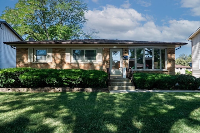 1416 S Chestnut Dr, Mount Prospect, IL 60056 - view of front of home with brick siding and a front lawn