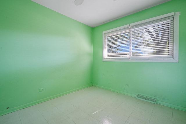 1416 S Chestnut Dr, Mount Prospect, IL 60056 - unfurnished room featuring baseboards and tile patterned floors
