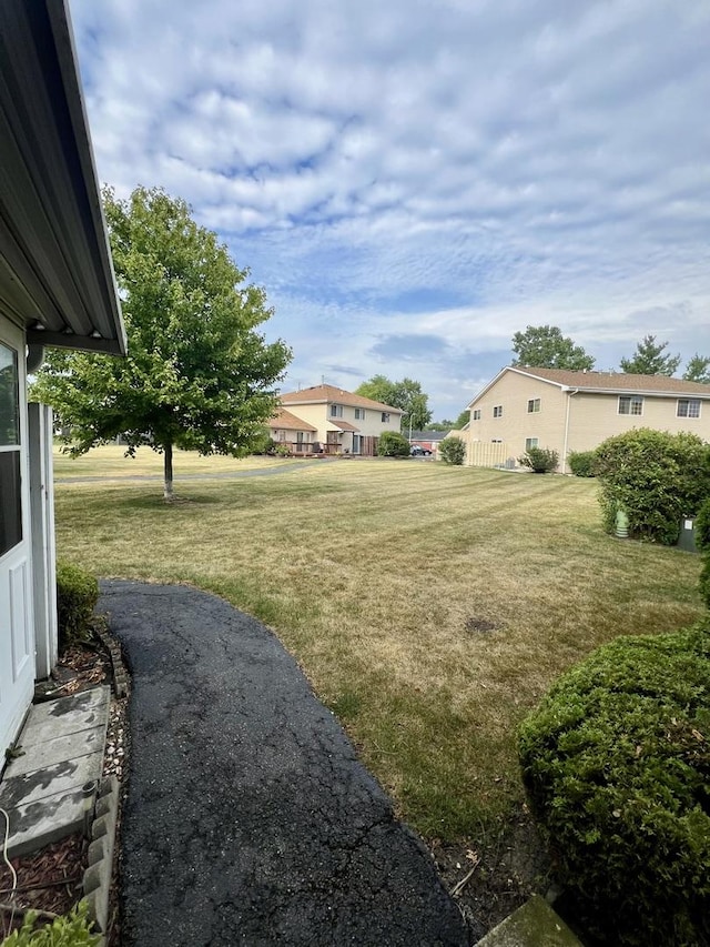 2350 Carnation Dr Unit 4, Crest Hill, IL 60403 - view of green lawn with a residential view