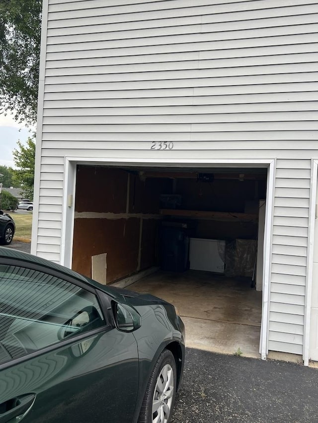 2350 Carnation Dr Unit 4, Crest Hill, IL 60403 - garage with asphalt driveway