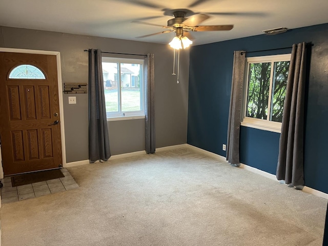 2350 Carnation Dr Unit 4, Crest Hill, IL 60403 - carpeted foyer with healthy amount of natural light and a ceiling fan