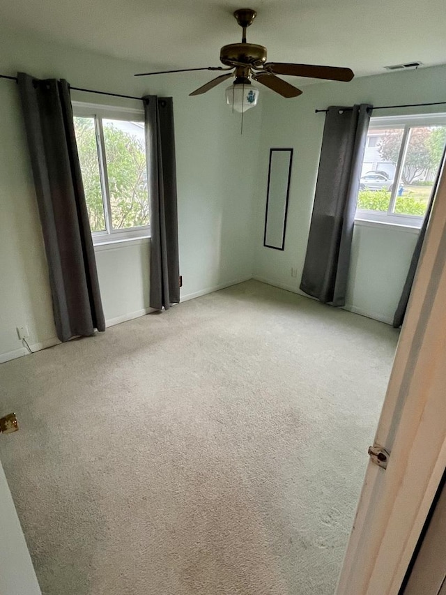 2350 Carnation Dr Unit 4, Crest Hill, IL 60403 - spare room with carpet flooring and ceiling fan